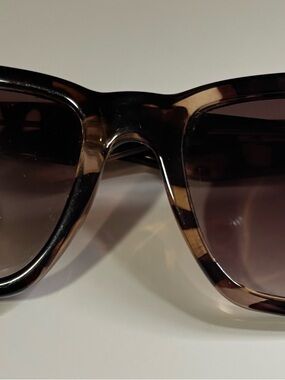 Quay Australia Oversized Tortoiseshell Sunglasses (after hours style) I believe.